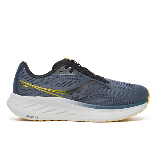 Side profile view of shoe with navy upper and yellow details with white sole on white background