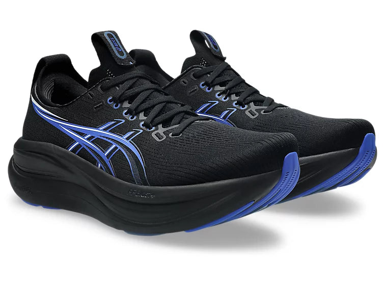 Black running shoes with blue accents on a white background
