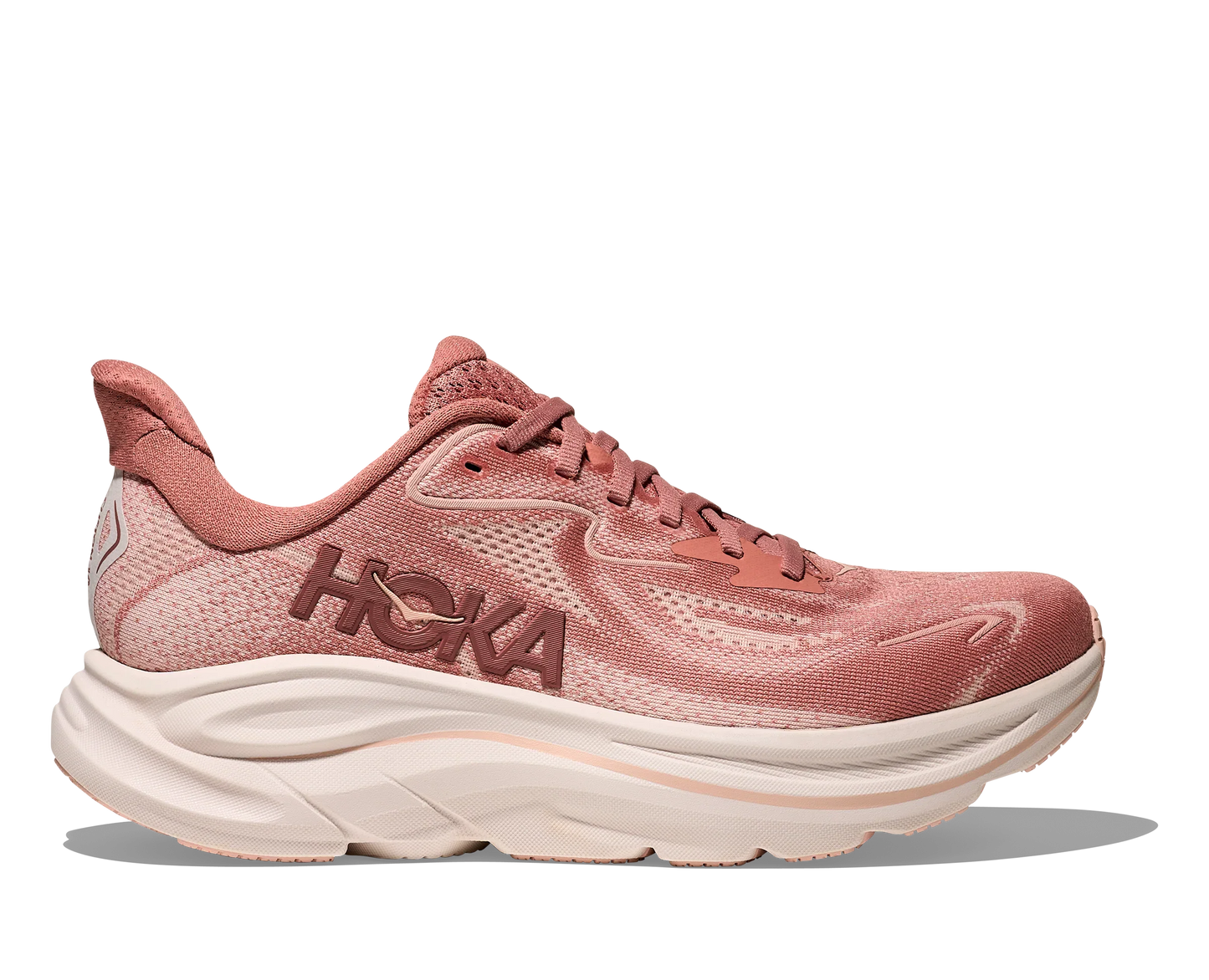 Lateral side view of women's dustrose pink Hoka Clifton 10 with off white sole