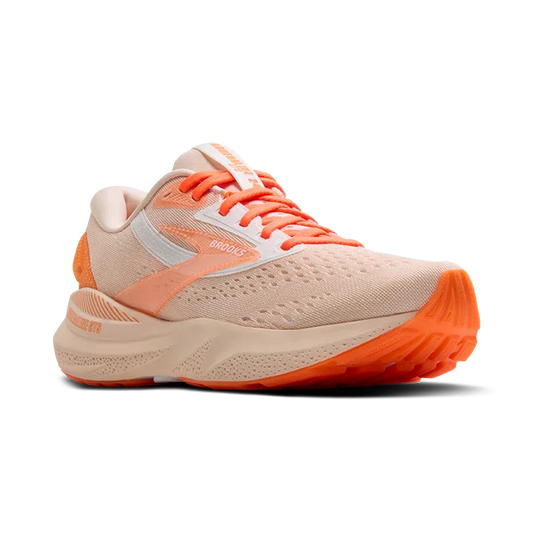 Diagonal angle of running shoes in orange colorway
