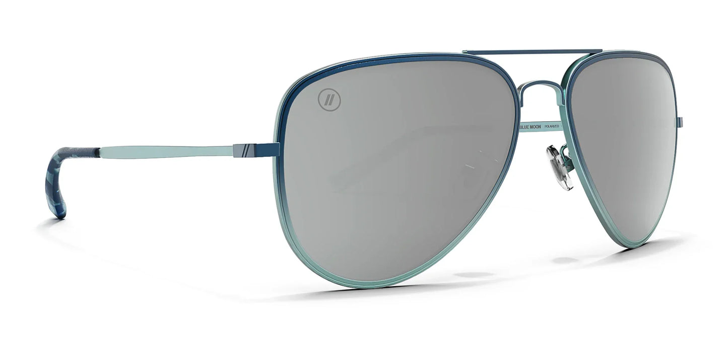 Aviator style Blenders sunglasses with blue frame and reflective lenses on a white background