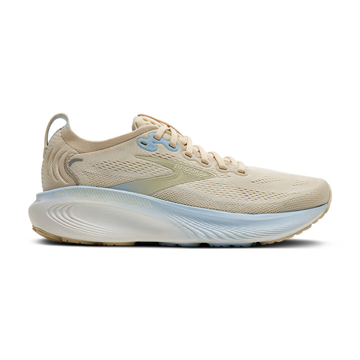 Beige Brooks running shoe with blue accents on a white background