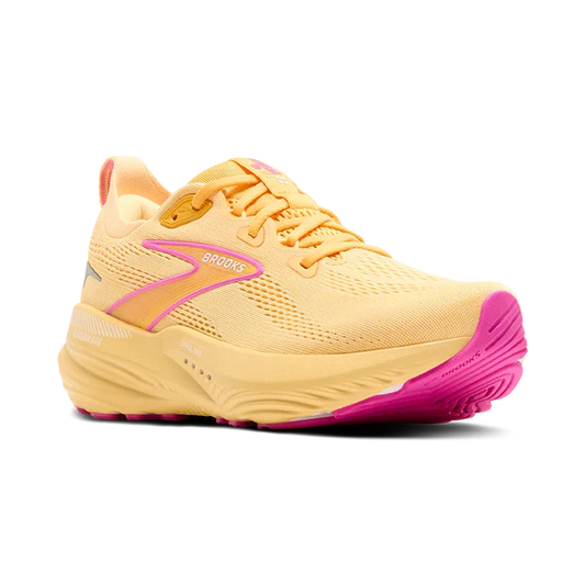 Angled view of Yellow Brooks GTS 22 running shoe with pink sole