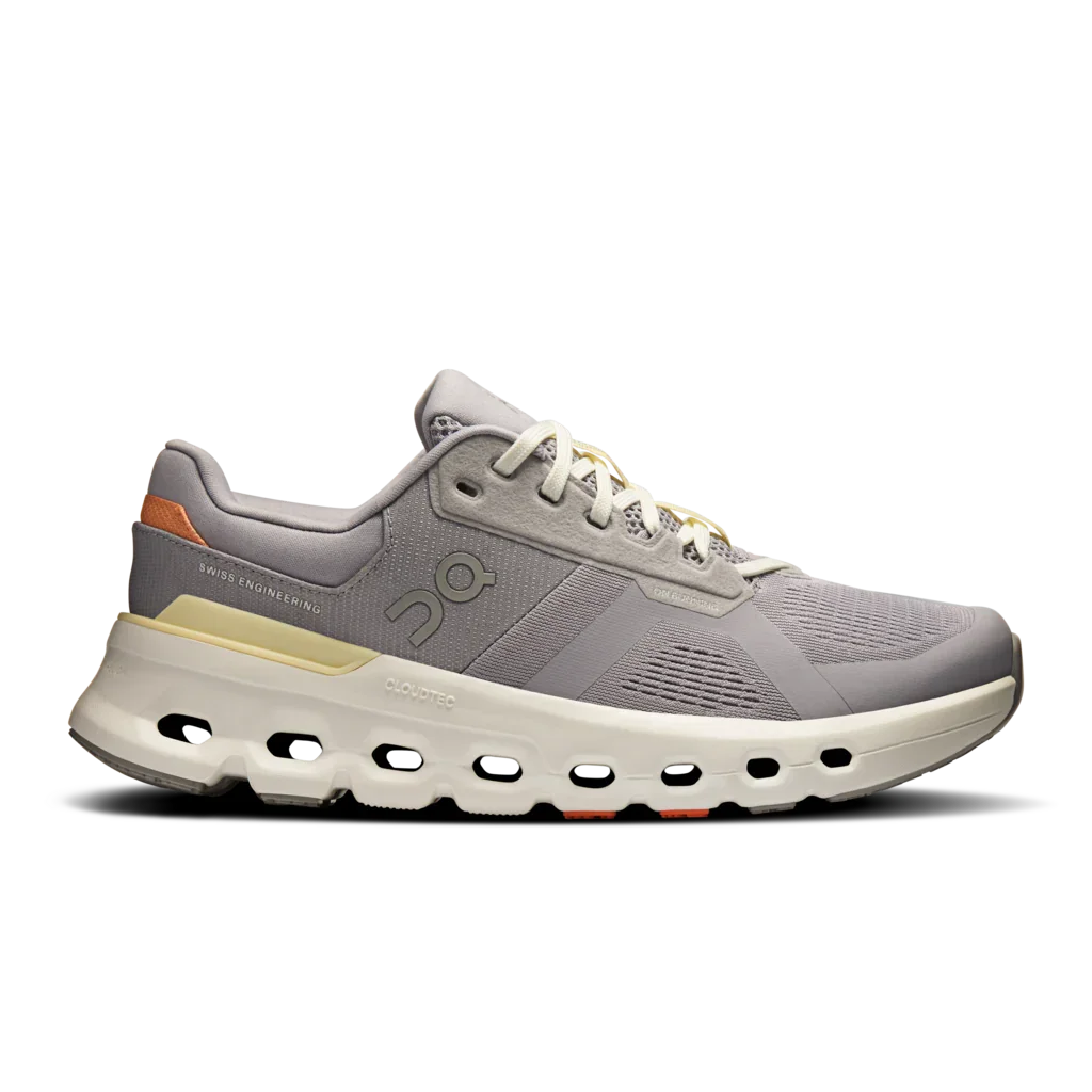 Lateral side view of Women's Lilac Cloudrunner 2 running shoes with white midsole, and orange and yellow detailing