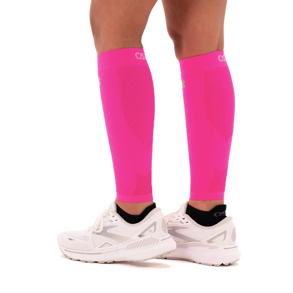 pink calf sleeves on model on white background