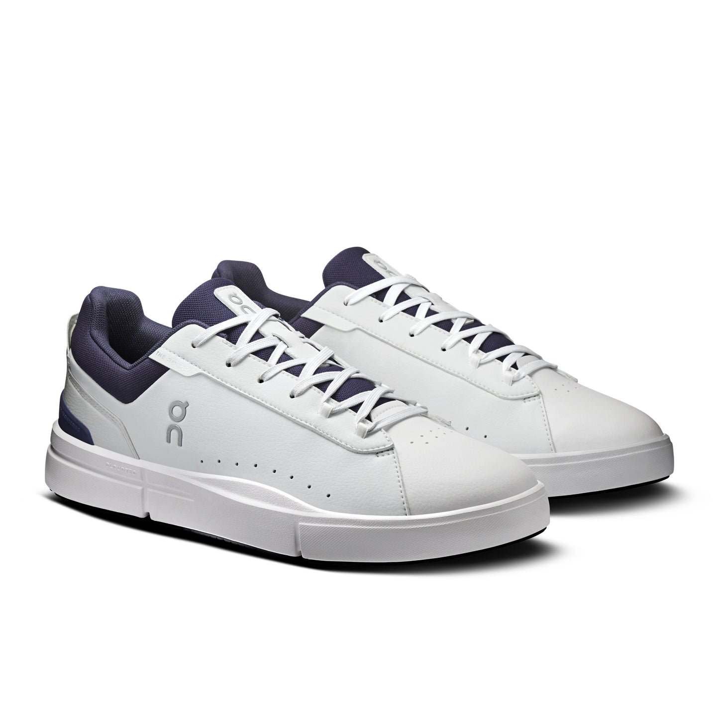 White Roger Advantage sneakers with navy accents on a white background