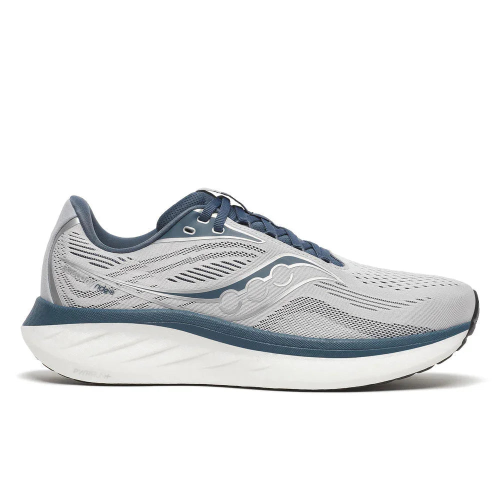 Side profile view of shoe with gray and navy blue upper with white sole on white background