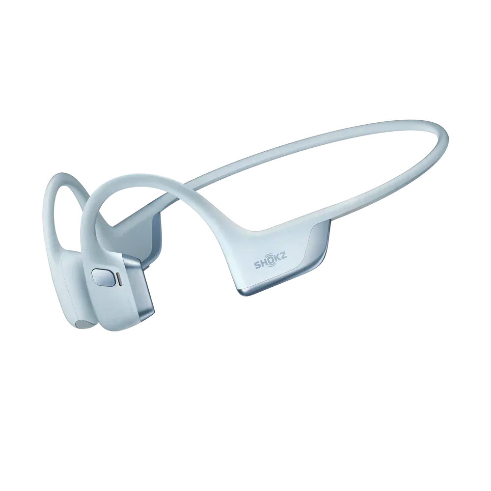 Sky blue Shokz bone conduction headphones on a white background