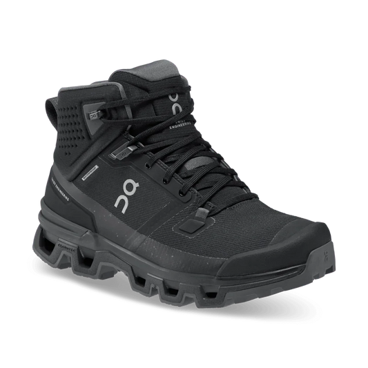 Black hiking boot with brand logo on a white background