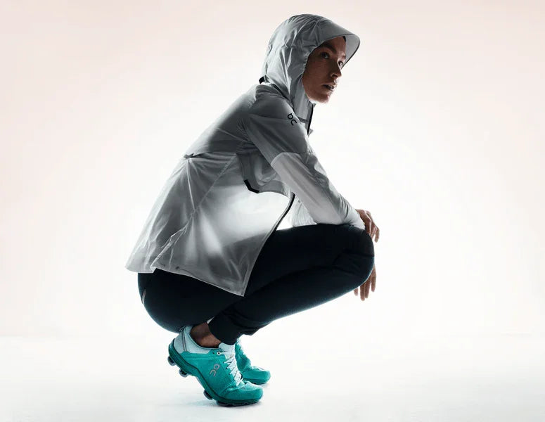 model wearing weather jacket in white|ice color